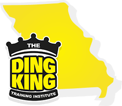 Logo of the Paintless Dent Repair Training Institute, featuring a black crown above text, set against a stylized yellow background shaped like Missouri.